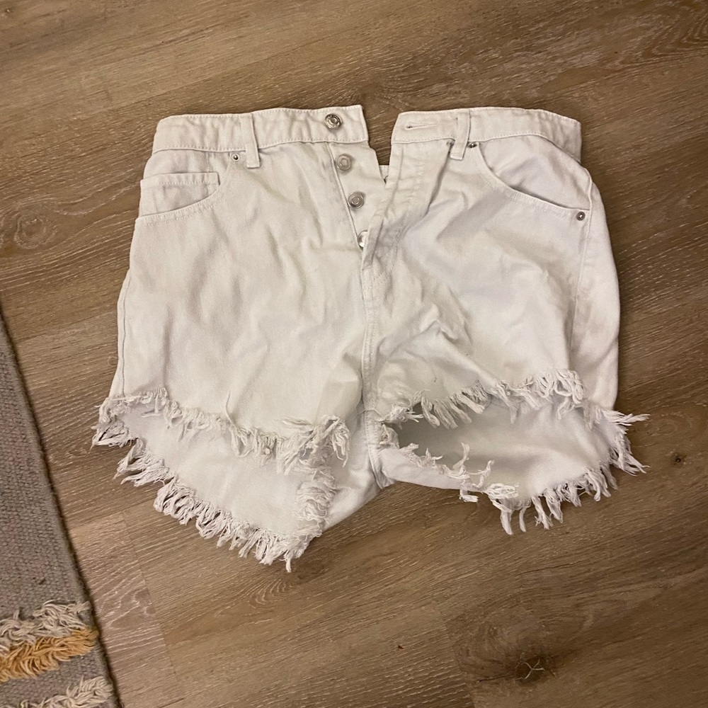 White denim ripped shorts